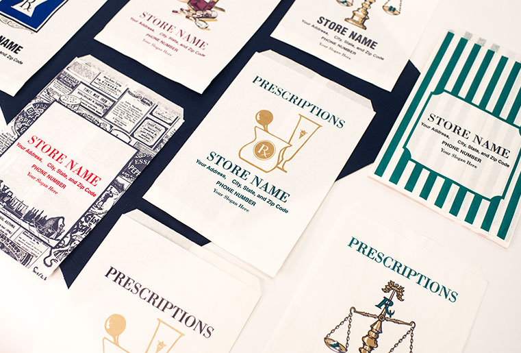 An array of custom pharmacy bags being printed out with designs set to be made for specific businesses.
